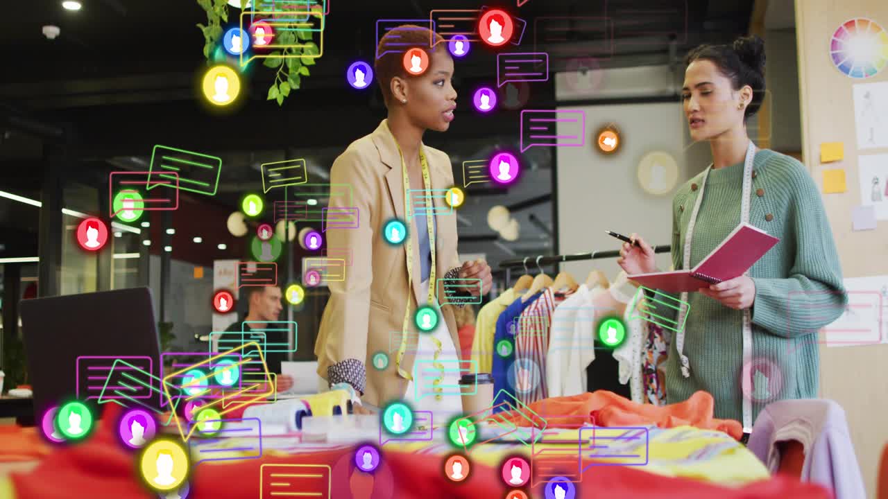 Fashion team opening pink notebook and pointing at fabrics, animated user icons linking selections