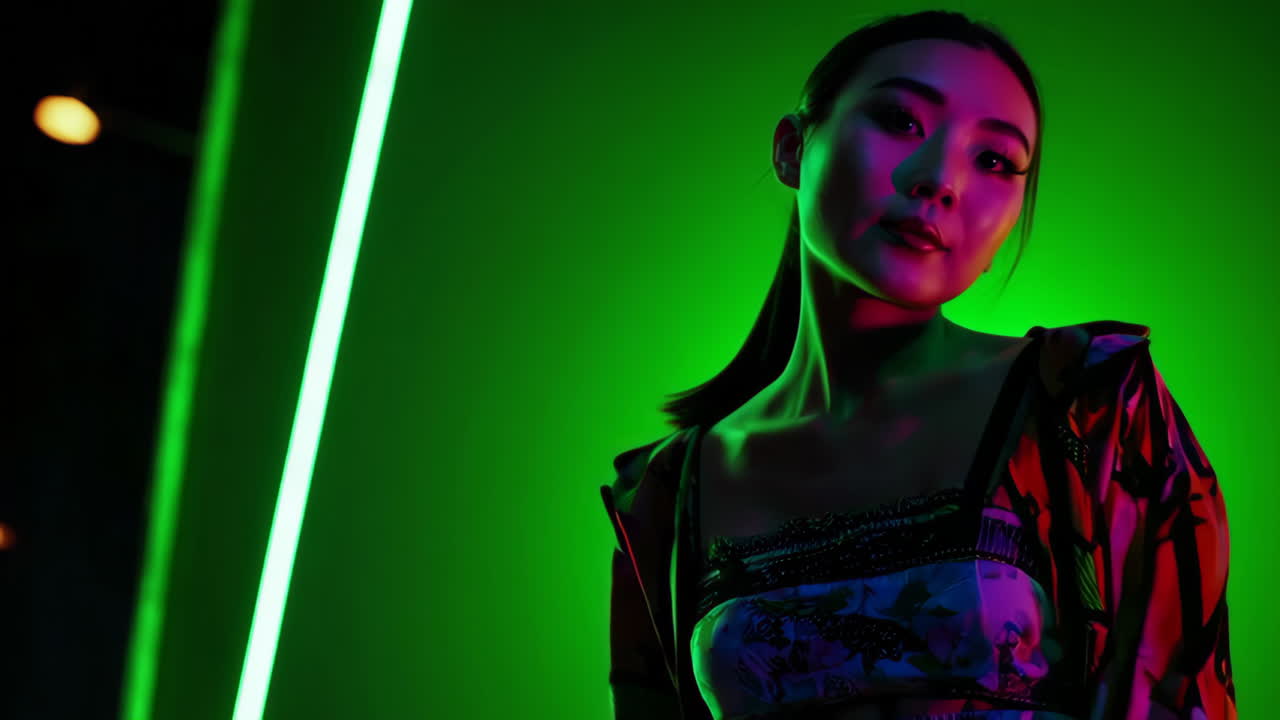 Vibrant Portrait of an Asian Woman in Green Neon Lighting
