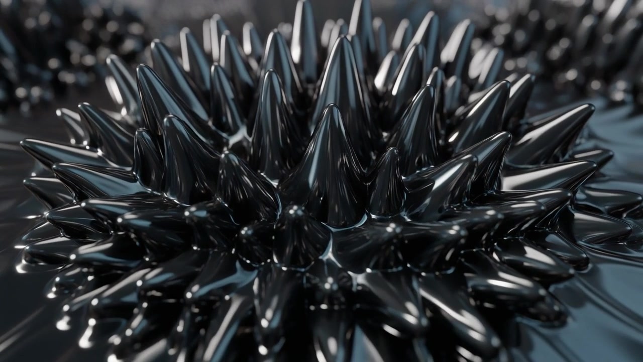 Ferrofluid-pigge, der dannes og trækker sig tilbage i et magnetfelt
