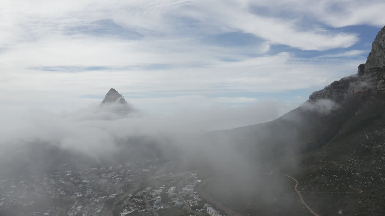 Aerial View of Cape Town, South Africa: Lion's Head and Table Mountain shrouded in Fog