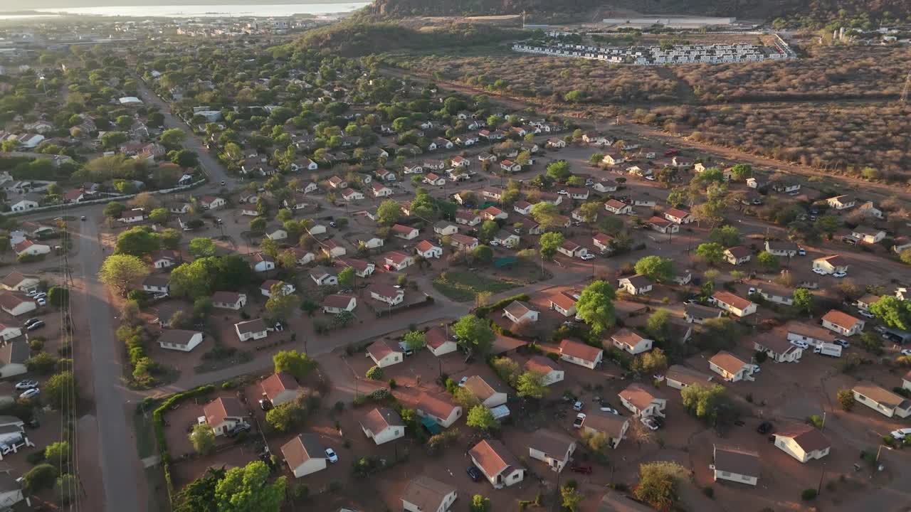 4K AERIAL VIEW OF BUILDINGS AND HOUSINGS IN AN AFRICAN , GABORONE CITY