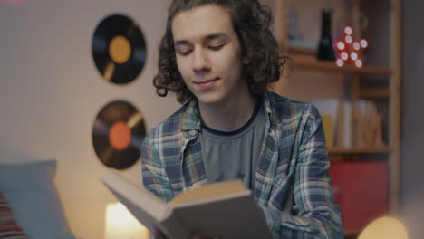 teenager reading at home