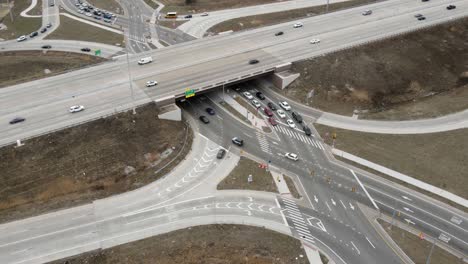 modern diamond shape highway intersection, aerial time lapse view