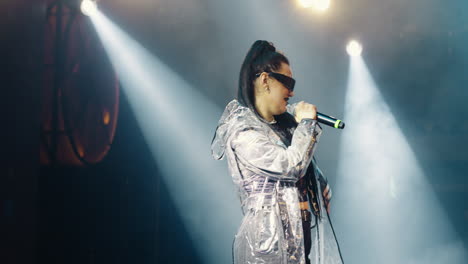 female singer performing on stage