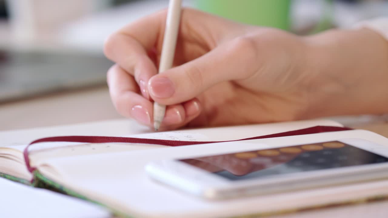 Female accountant calculate numbers. Bookkeeper calculate on smart phone