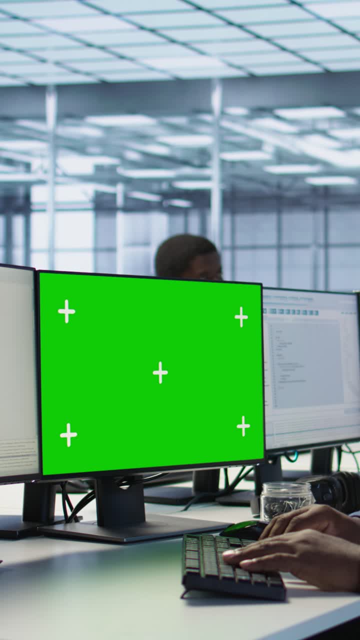 Vertical video Data center computer scientist using mockup monitor
