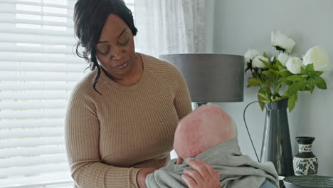 caregiver assisting elderly man with clothing