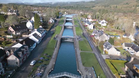 aerial pullback reveals beautiful canals in scotland