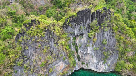 Sheer-mountain-cliffs-of-el-nido-in-palawan,-jagged-tropical-grey-rocks