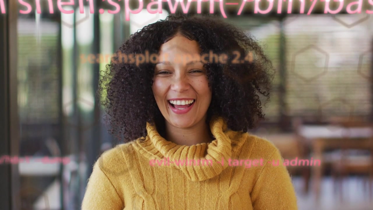 Una donna reagisce in un caffè tecnologico mentre un'interfaccia di codice rosa mostra 'ACCESSO CONCESSO', sorridendo e poi ridendo.