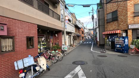 a peaceful, empty street in a japanese town.