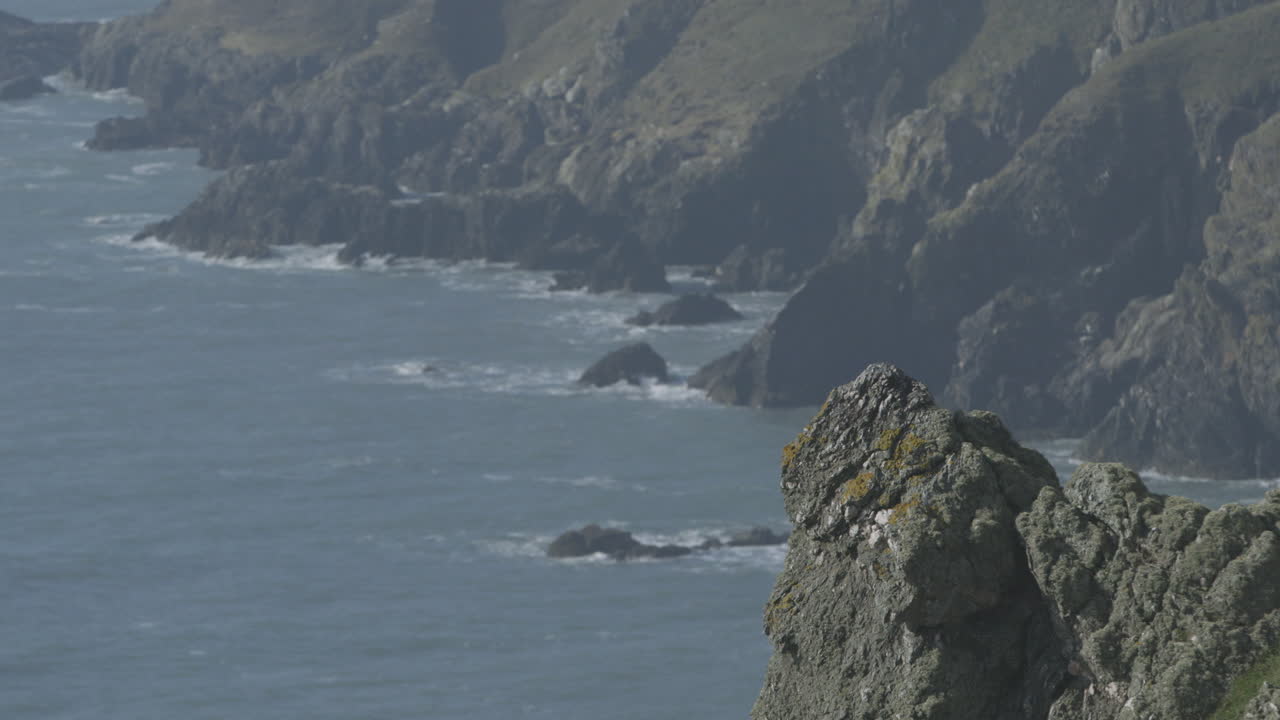 la costa sur de devon en un tranquilo día soleado