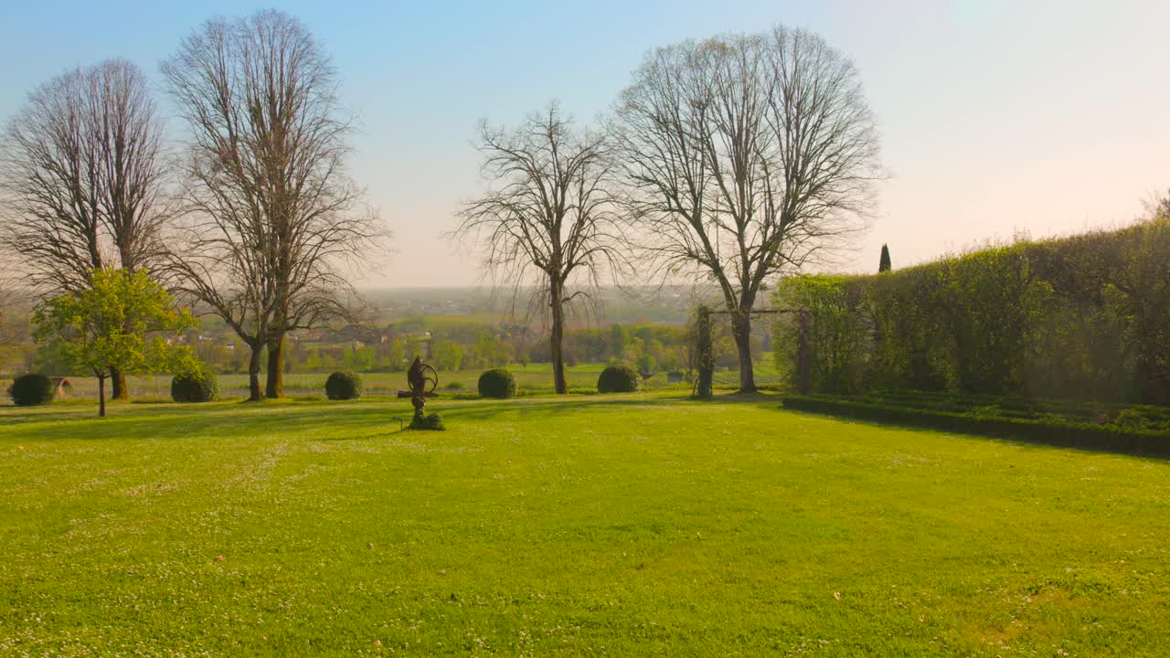 A tranquil view showcasing the lush yard of François Mauriac’s former residence