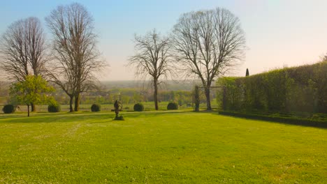 a tranquil view showcasing the lush yard of françois mauriac’s former residence