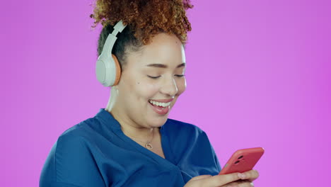 Typing-on-phone,-music-and-woman-with-headphones