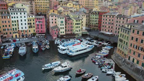 Camogli-coast,-Liguria,-in-Italy-with-clear-sea-in-winter-at-sunrise-and-aerial-view