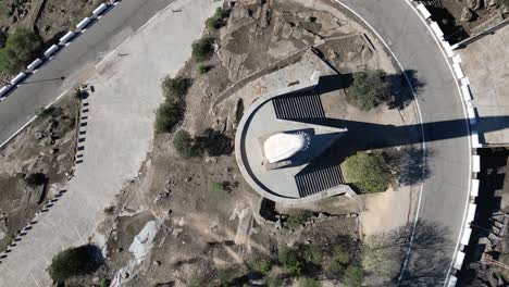 Top-down-reveal-shot-of-Madonna-statue-at-Our-lady-of-Cabeza-Spain