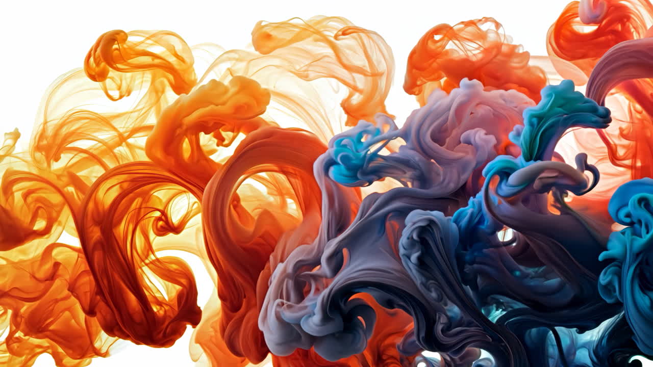 A colorful smokey line with orange and blue colors. The line is long and flowing. It gives a sense of movement and energy
