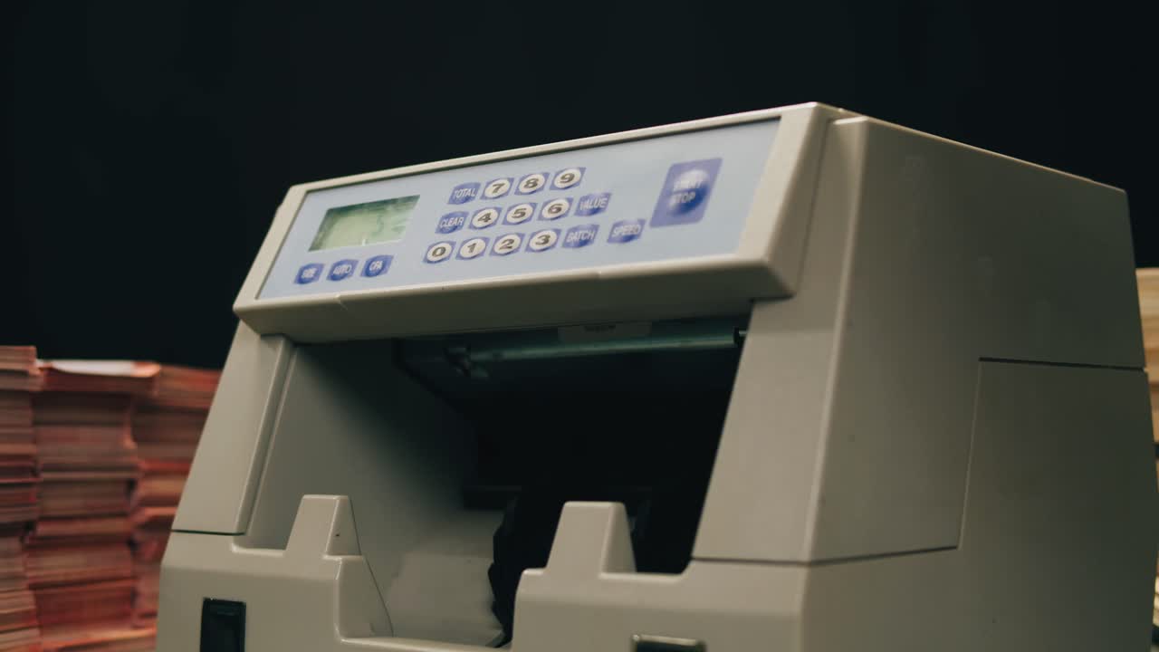 Specialised police officer Counting dollar banknotes in crime lab, conceptual image. High quality 4k footage