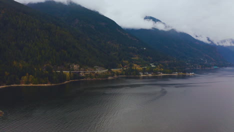 Flying-along-the-Sea-to-Sky-Highway-on-an-overcast-day-in-the-mountains