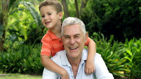 Mature-man-posing-with-his-grandson-