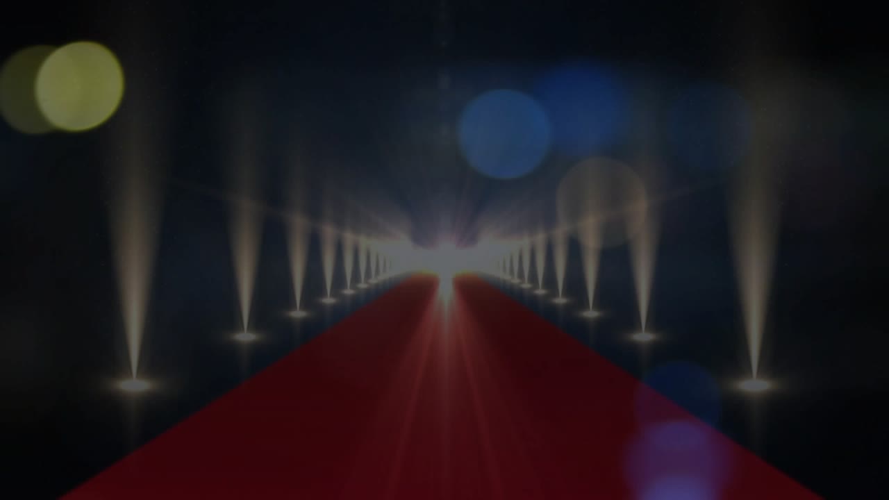 Inizia nell'oscurità, con un tappeto rosso che emerge con luci pulsanti, bokeh fluttuante che crea un'atmosfera drammatica da passerella