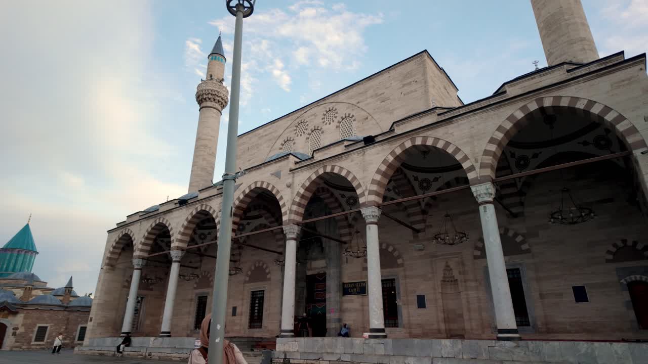 The forecourt of Selimiye Mosque in Konya displays intricate arches and minarets, representing Turkish Islamic architectural beauty