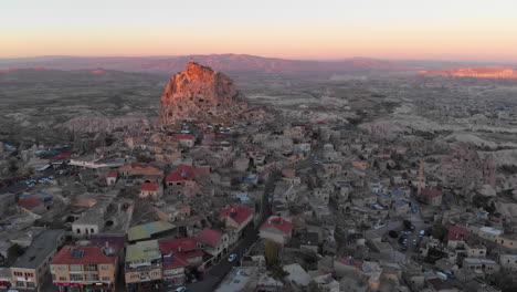 Aerial-view-to-Uçhisar-fortress-in-Goreme-Cappadocia,-Turkey