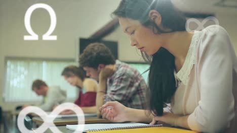 animation of mathematical symbols floating over multi-ethnic group of students sitting in a classroo