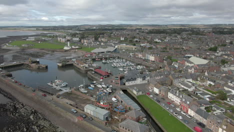 an aerial view of arbroath harbour and town on a cloudy day