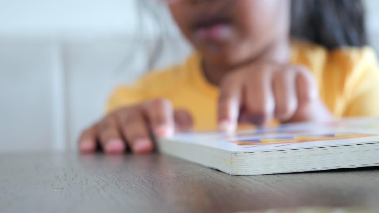 Child Reading a Book