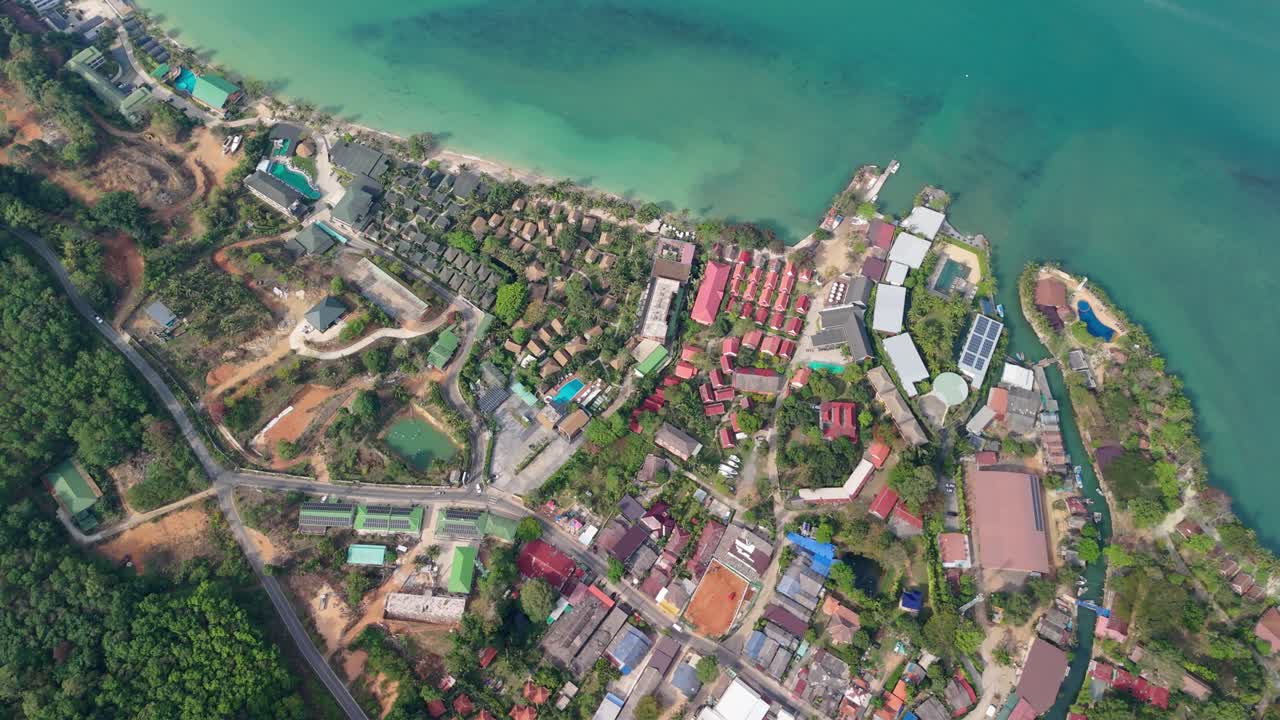 aerial drone footage of Kai Bae village on Koh Chang island with hotel accommodation and the ocean from a high angle