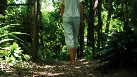 woman walking in the park 4k