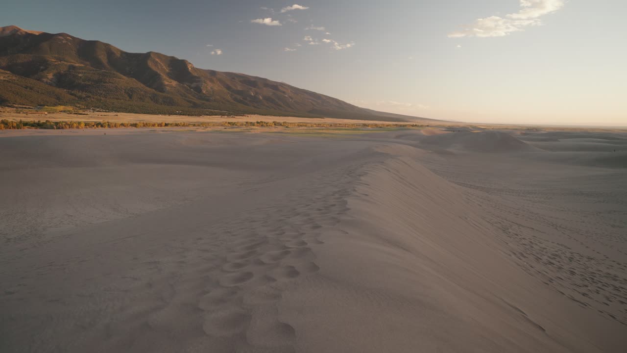 Sand Dunes and Mountains Landscape