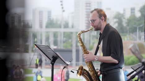 saxophonist performing outdoors