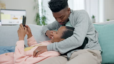 Happy,-relax-and-a-black-couple-with-a-phone