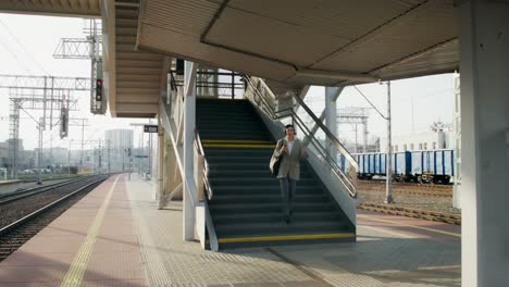 business person at train station platform