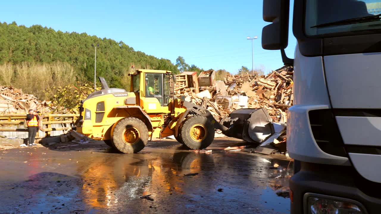 Wheel Loader and Truck at Recycling Center
