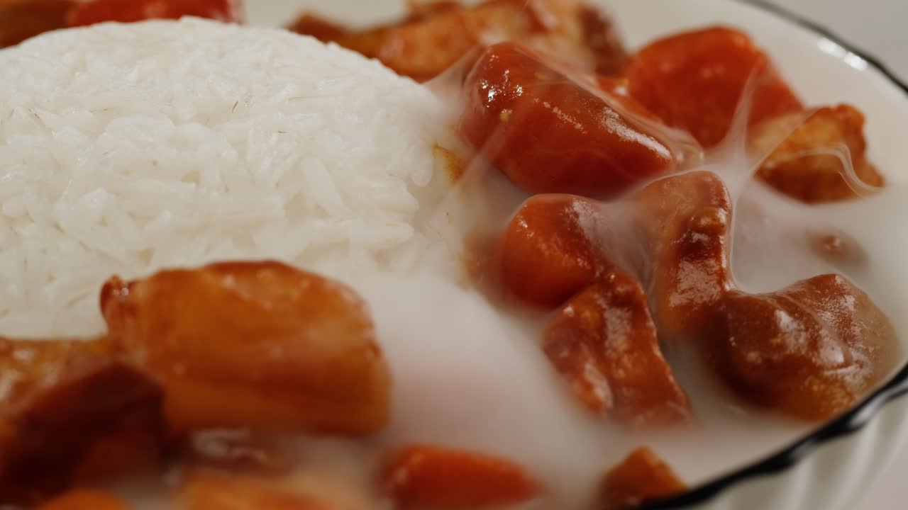 Japanese curry rice with fry pork Tonkatsu, Katsu Kare, Japanese breaded cooking dinner in restaurant, close up macro of asian food
