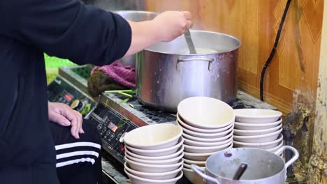 sequential pouring of water from one pot to another