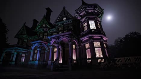 spooky victorian mansion at night