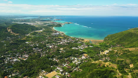 panoramic view of mandalika and its lush turquoise waters, kuta, lombok