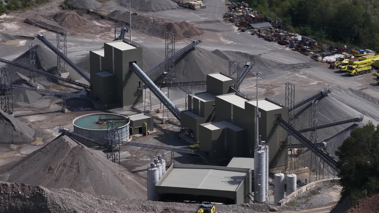 Cement factory in the area of Bergamo, Italy. Construction materials. Aerial drone video
