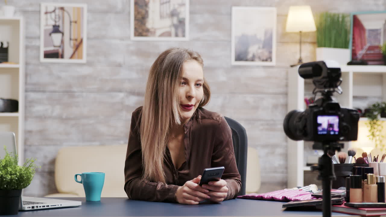 Woman filming a video in her studio