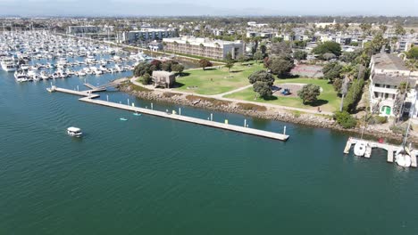 boats travel through a busy marina