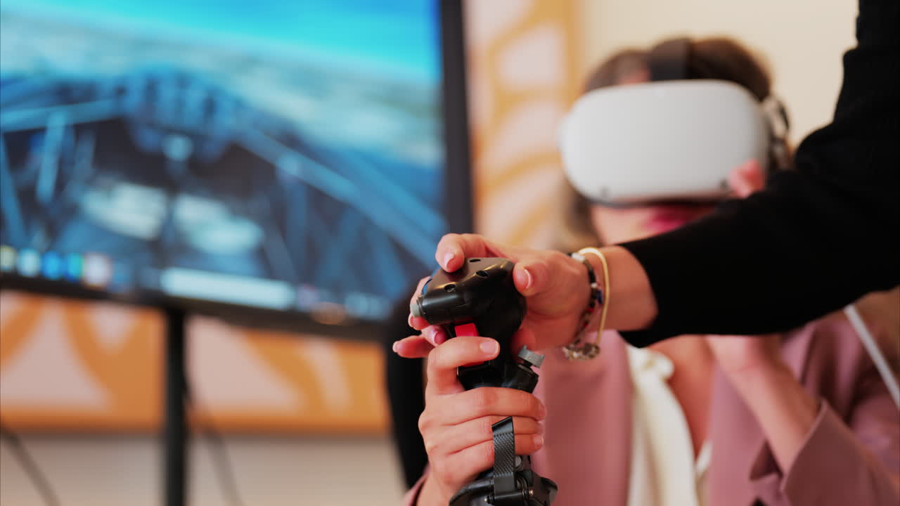 Woman wearing a Virtual Reality headset, playing games, holding a handle