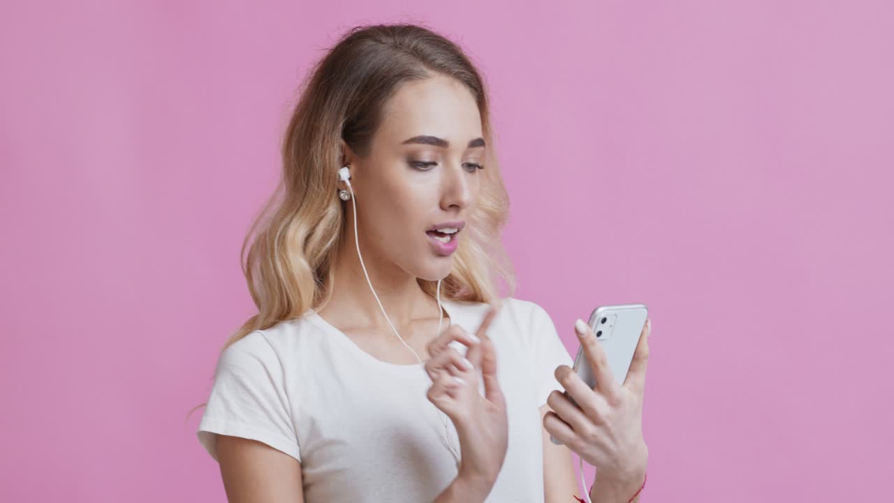 Woman on video call with headphones
