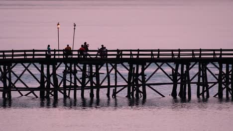 The-Mon-Bridge-is-an-old-wooden-bridge-located-in-Sangkla,-Thailand