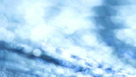 bokeh azul, fondo abstracto, luces desenfocadas, imágenes de alta calidad en 4k.