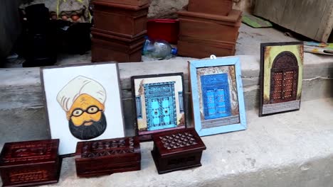 closeup of frames on sale of typical zanzibar doors in local store